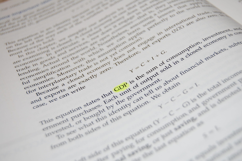 high angle view, paper, 2K, economics, publication, learning, page, studying, book, selective focus, indoors, western script, gdp, no people, message