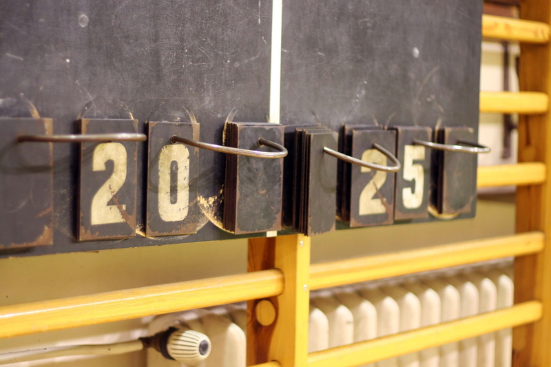 no people, indoors, business, letter, result, communication, sport, focus on foreground, yellow, 2K, sign, architecture, day, selective focus, large group of objects