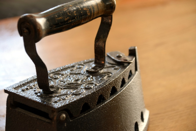 old iron, ironing service, beautiful, flatten, black, antique, house work, focus on foreground, still life, greeting card, smoothing, wood, indoors, communication