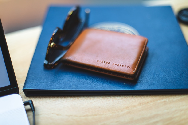 bokeh, wallet, book, bi, blur, mood, still life, small group of objects, note pad, cafe, coffee shop, pen, close-up, text, wood - material, blue, table