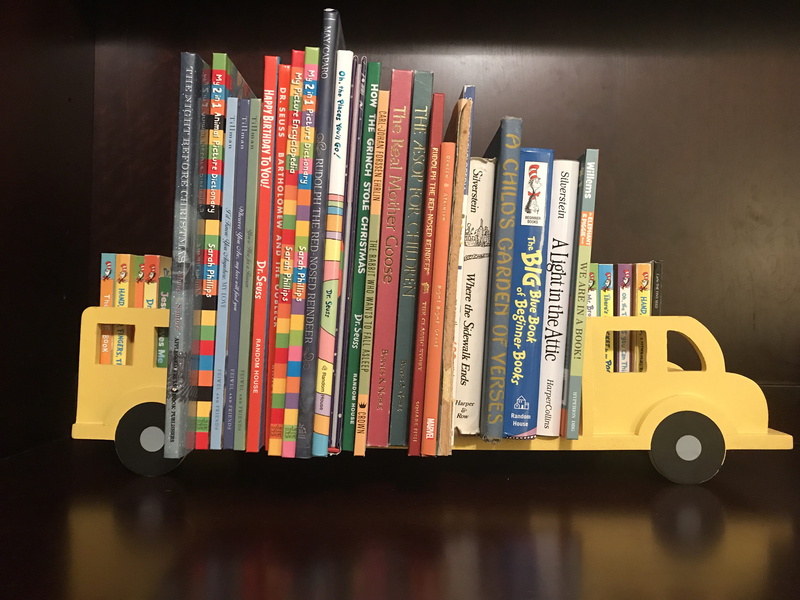 yellow, kids books, bookcase, wood, publication, wisdom, close-up, library, dr seuss, dr. seuss, accessory, large group of objects, arrangement, multi colored