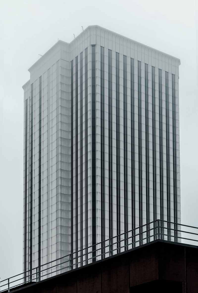 tower, office building exterior, architecture, pattern, clear sky, sky, built structure, bridge - man made structure, infrastructure, city, bridge, railing