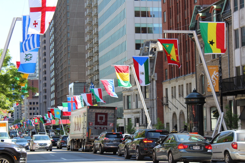 car, day, built structure, nature, montréal, skyscraper, motor vehicle, city, city street, 5K, office building exterior, patriotism, flags, no people