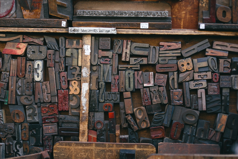 full frame, abundance, stamps, communication, wood, 5K, wood - material, variation, large group of objects, day, assorted, indoors, arrangement, old, no people