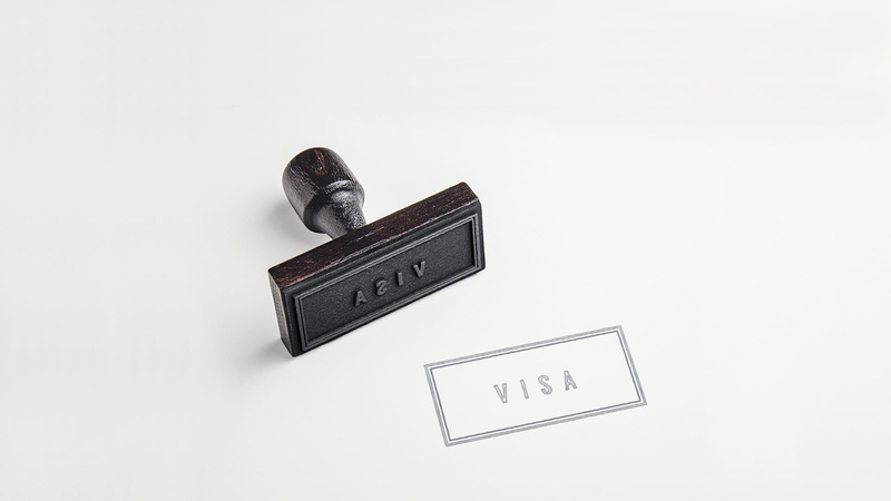 cut out, equipment, white color, copy space, indoors, communication, high angle view, technology, stamp, western script, still life, passport visa, white background
