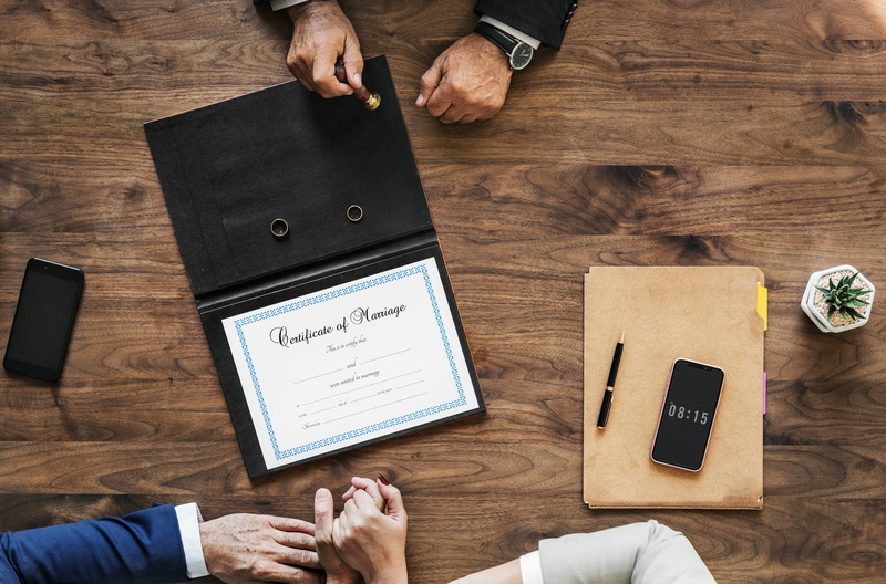 official, 1080P, indoors, woman, technology, human body part, certificate, legal, stamp, furniture, pot, holding hands, table, couple, business, flatlay