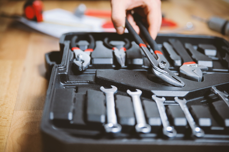 mode of transportation, adult, set, human hand, one person, work tool, repairing, 5K, equipment, suitcase, technology, men, human limb, indoors, control