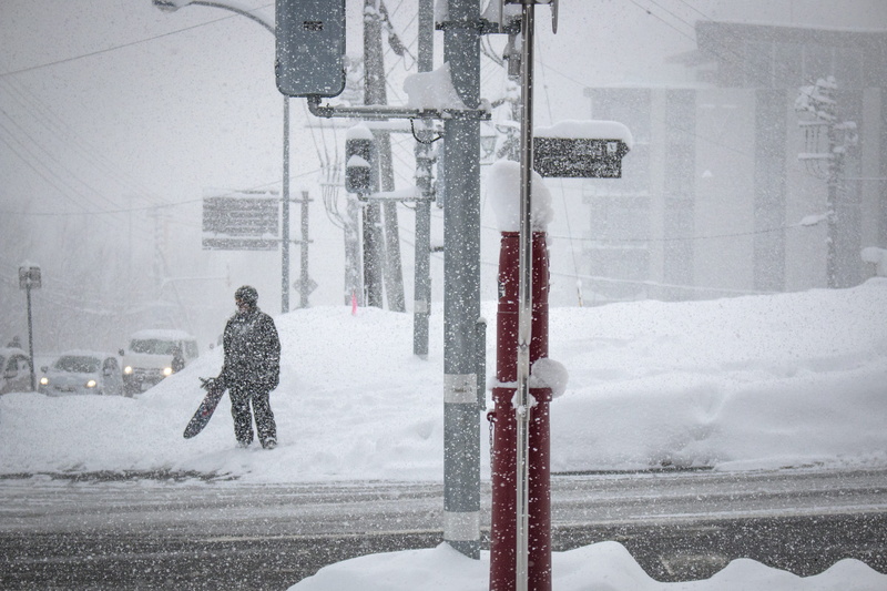 urban, nature, one person, snowing, snowboarder, person, ground, holding, day, photo, ski, town, warm clothing, outdoors, storm, near, city, full length