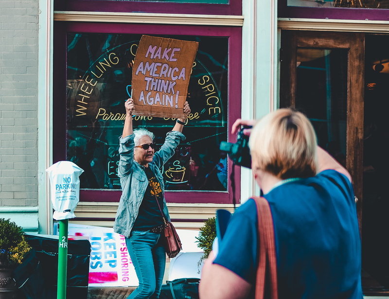 democracy, young adult, cameraman, men, real people, menu, casual clothing, communication, protest, day, group of people, lifestyles, non-western script