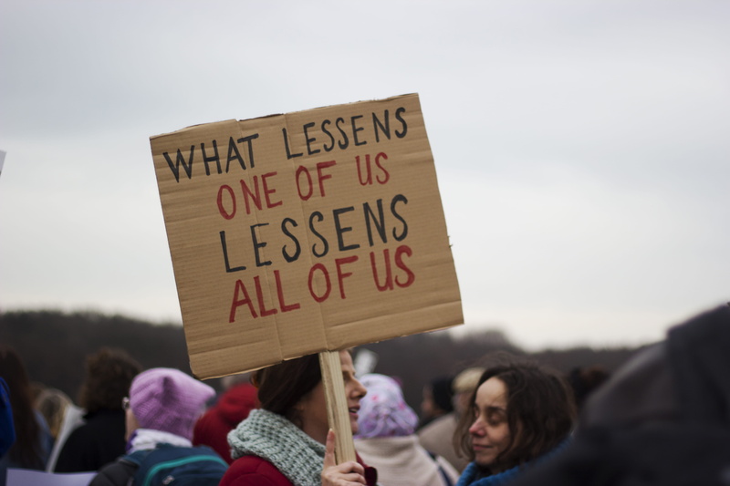 human body part, banner - sign, message, offroad, group of people, parade, rally, social issues, #resist, text, peace, nederland, focus on foreground, the hague