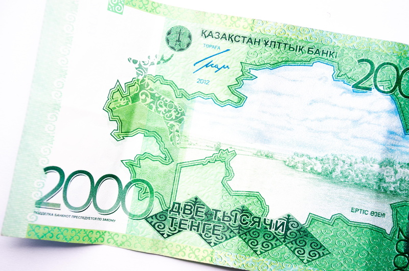 global communications, studio shot, kazakhstani tenge, income, earnings, money, shopping, paper currency, finance and economy, currency, business, indoors
