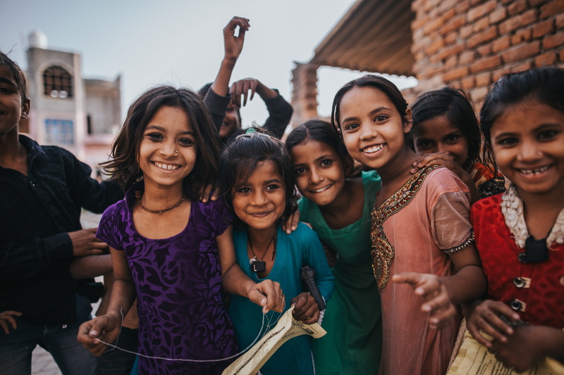 human, group, happiness, 5K, smiling, young adult, lifestyles, enjoyment, india, wall, bricks, colorful, adult, play, fun, children, city, teeth, standing