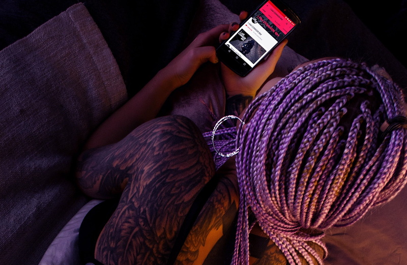 tattoo, person, browse, textile, holding, warm clothing, one person, creativity, purple, smartphone, wool, 1080P, hair, real people, hairstyle, people