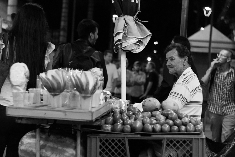 human, 5K, sitting, lighting, market stall, street seller, bazaar, plant, beside, store, person, mango, medellin, retail, real people, freshness, business
