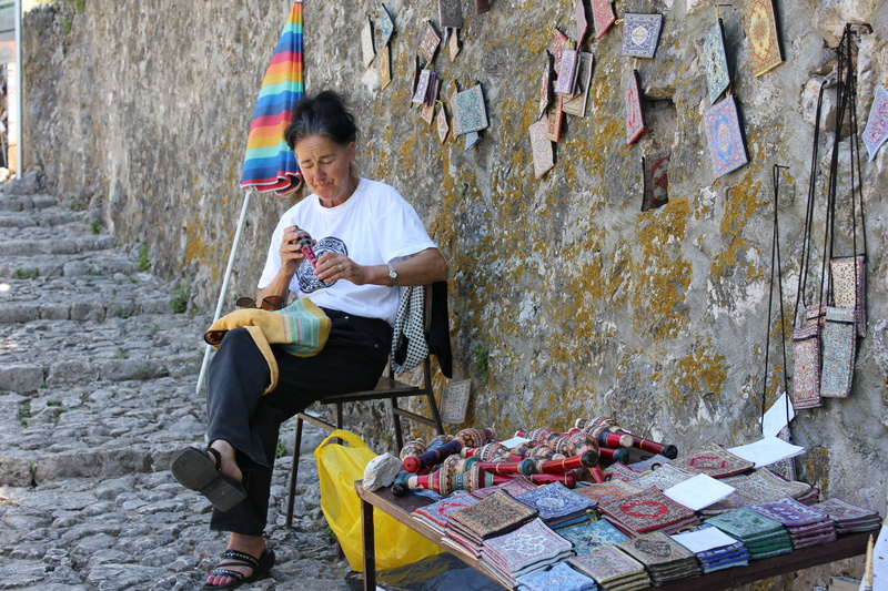 one man only, food and drink, adults only, looking, outdoors, turk village, dealer, food, one person, holding, day, leisure activity, 5K, handmade, casual clothing