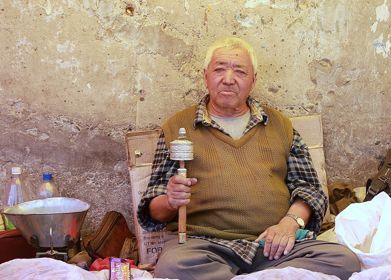 adult, home interior, ladakh, senior adult, indoors, dealer, prayer, leisure activity, men, white hair, sitting, real people, buddhism, holding, looking at camera