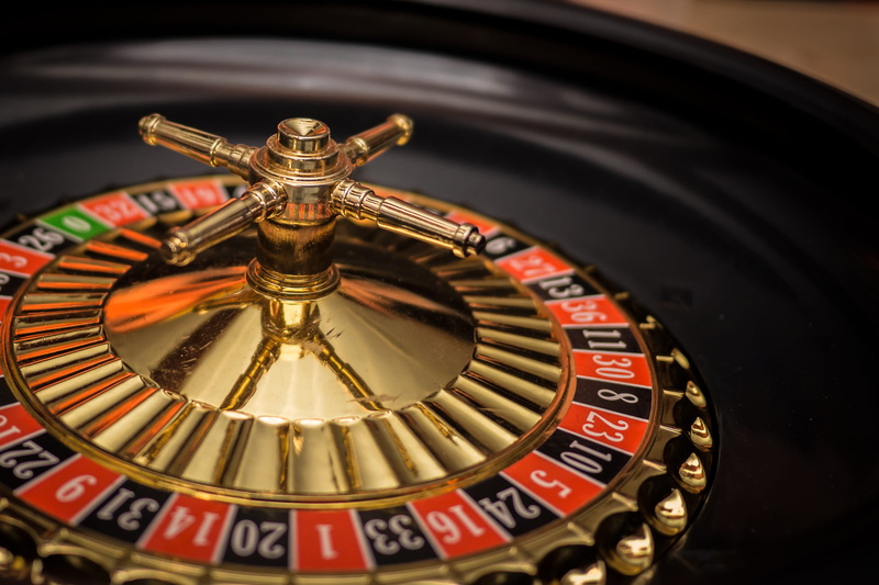 red, 2K, close-up, success, indoors, opportunity, casino, black, selective focus, achievement, dealer, spinning, luck, studio shot, high angle view, gambling