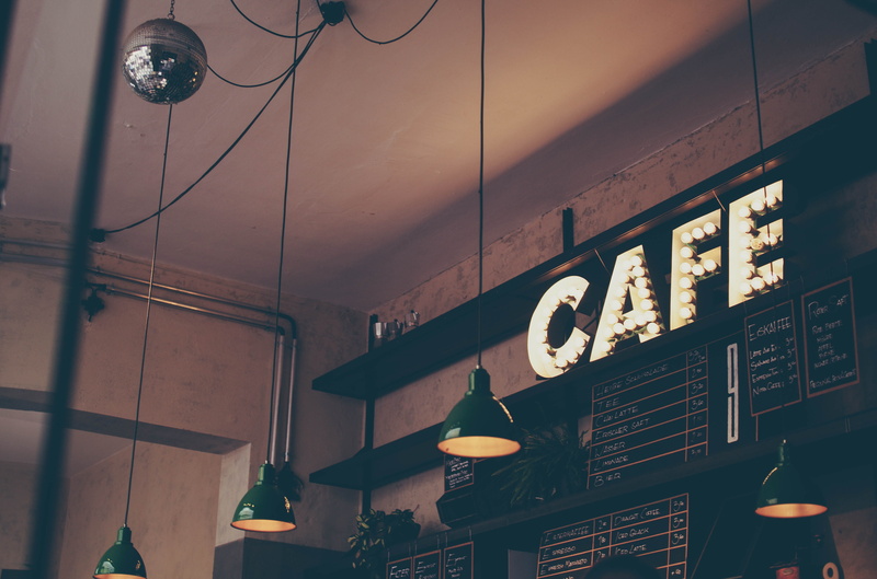 urban, low angle view, indoors, light, decoration, light bulb, bar - drink establishment, bar, ceiling, menu, electric lamp, light fixture, warm, boards