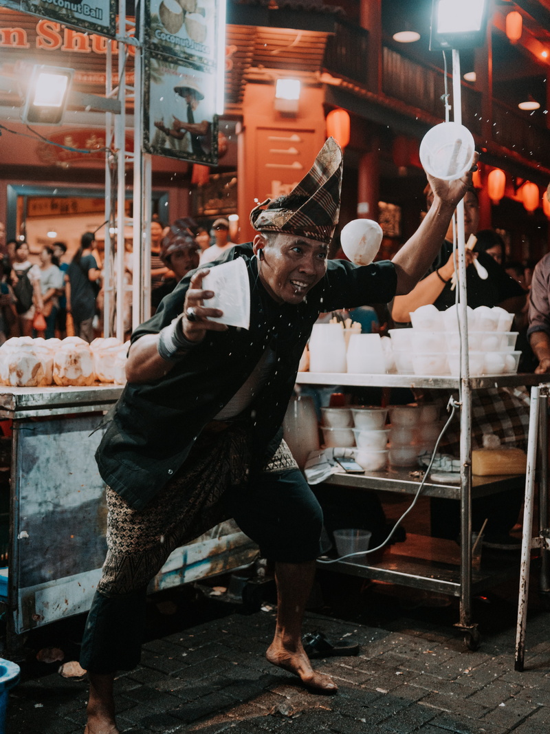 malacca, indoors, foodmarket, full length, occupation, business, malaysia, night, casual clothing, white, splash, stallurban, incidental people, stall