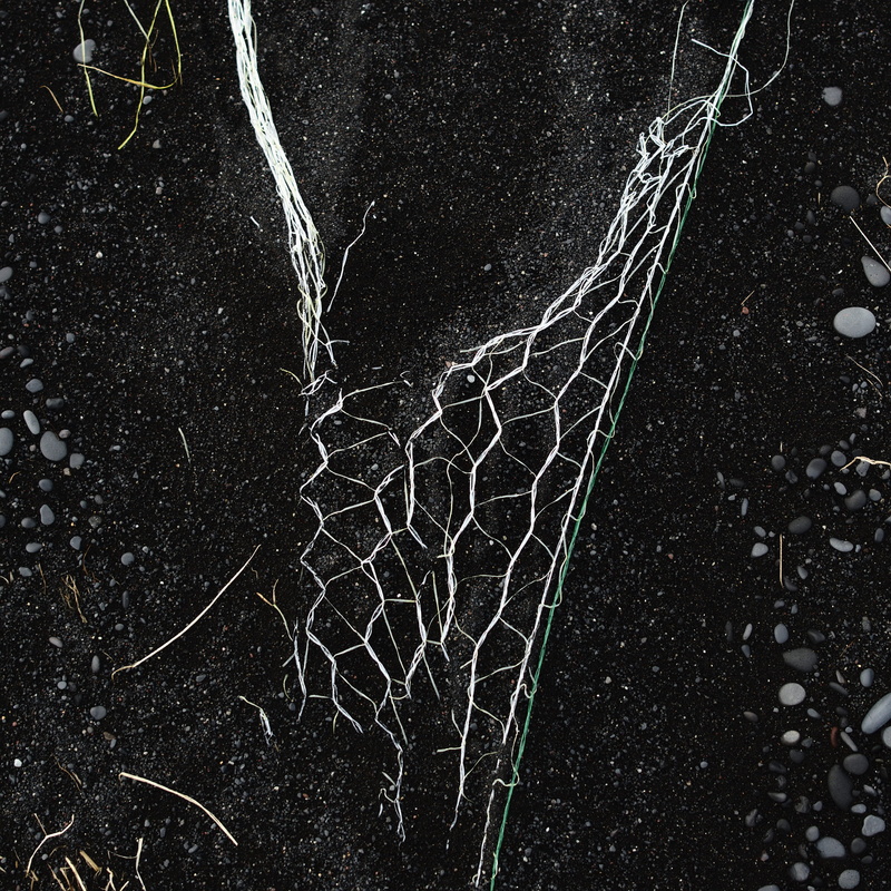 spider web, maritime, sea, beach, net, fishing net, nature, beauty in nature, road, black sand, iceland, high angle view, no people, dirt, close-up, black