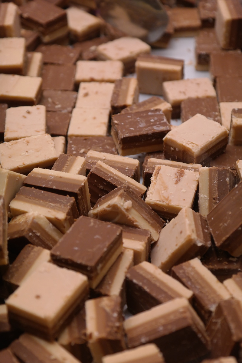 confectionery specialities, indulgence, sweet food, large group of objects, calories, no people, abundance, stack, full frame, indoors, cocoa, high angle view