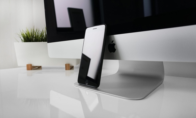 smartphone, domestic room, black, office, furniture, built structure, apple, white, gray, desktop, space, sofa, leaning, coffee table, living room, domestic life