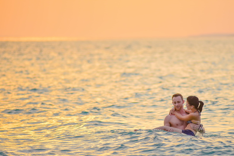 two people, outdoors, morning, evening, males, wedding, kiss, honeymoon, couple - relationship, maldives, romance, sea, sky, happiness, affair, couple