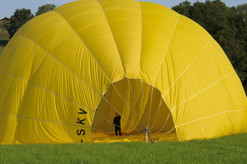 hot air balloon, man, summer, gas tight envelope, adventure, full length, air, preparation, outdoors, gas filled, plant, lifting gas, helium, landing, day