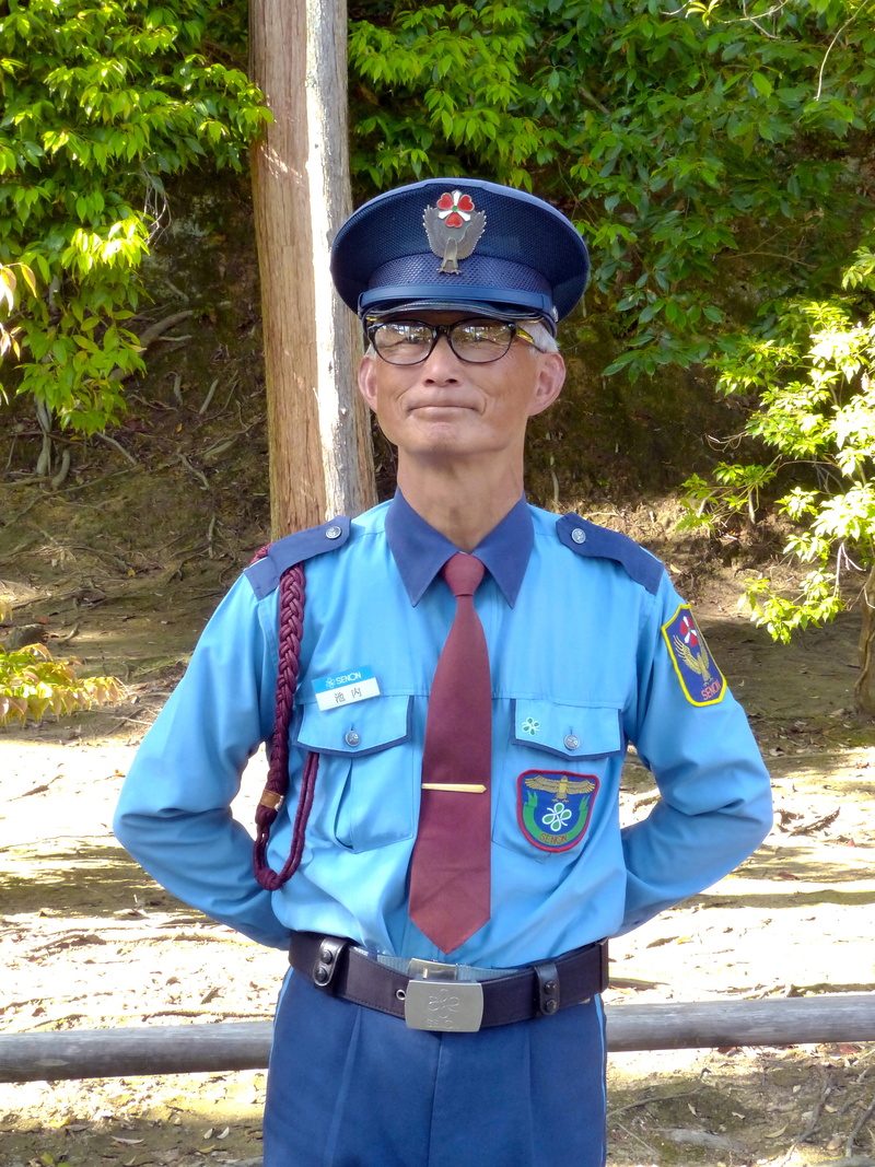 leisure activity, standing, adult, wearing, nature, s, officer, near, security, man, old man, mature adult, mature men, uniform, japanese, day, blue, outdoors