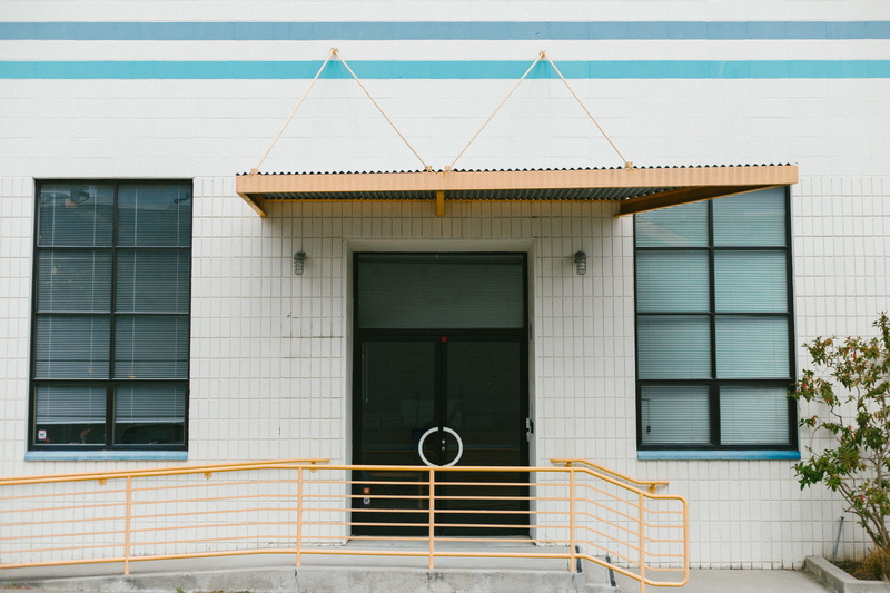 glass - material, sign, no person, white, facade, color scheme, architecture, retro, black, window, closed, line, concrete, building, colorful, muted, day