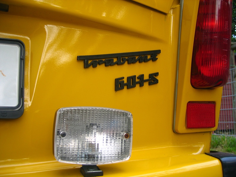 taxi, history, close-up, vehicle, city, divided germany, spotlight, car, cult, indicator, text, land vehicle, travel, public transportation, day, outdoors