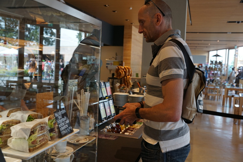 lake constance, shopping, side view, three quarter length, one man only, looking, 5K, bread, bar, people, delicious, display case, striped, small business