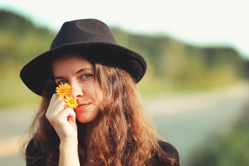 front view, hair, food, real people, pollen, sun hat, swimwear, leisure activity, clothing, pineapple, cowboy hat, mouth, 4K, one person, hairstyle, apparel