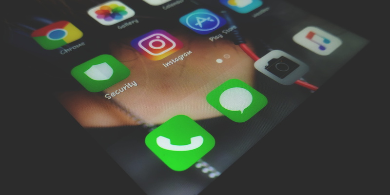illuminated, business, symbol, desktop, telephone, screen, phone, security, high angle view, text, indoors, internet, data, no people, mobile phone, network