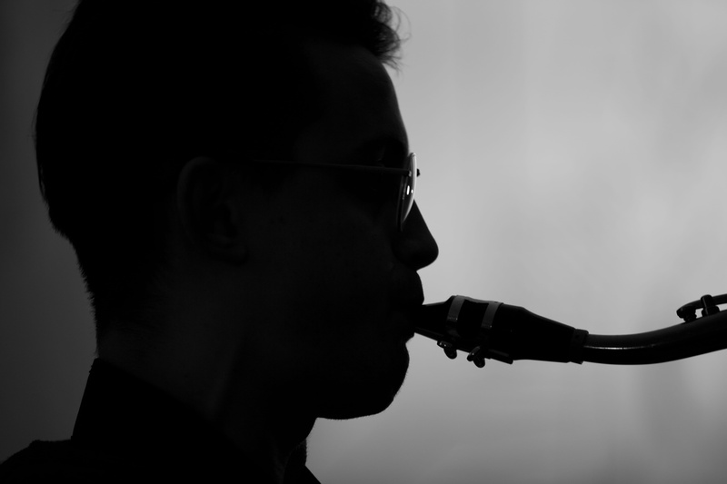 silhouette, profile view, voghera, player, human body part, leisure activity, jazz, portrait, one person, side view, holding, 5K, men, eyeglasses, saxophone
