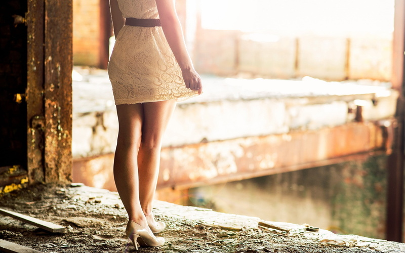 sunlight, real people, leisure activity, see-through skirt, lifestyles, low section, feet, young adult, high heels, nature, leg, walking, one person, adult