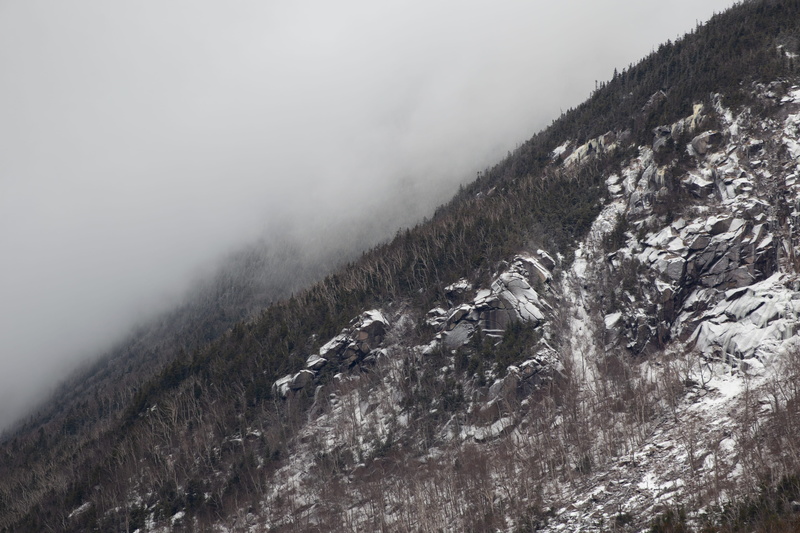 no people, grayscale, foggy, cold temperature, rocks, mountainside, nature, environment, snow, trees, 5K, mist, daylight, non-urban scene, winter, cold