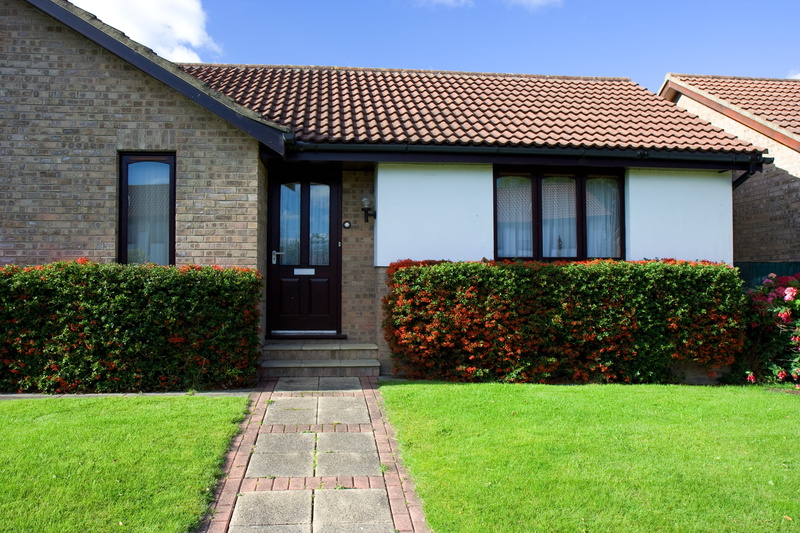 outdoors, daytime, windows, lawn, building, grass, growth, house, green color, window, footpath, door, architecture, day, entrance, plant, bush, concrete