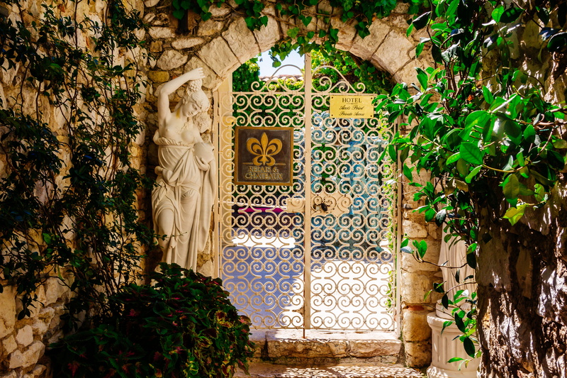 tree, green, communication, chateaux, door, nature, day, green color, growth, pattern, hotel, building, plant, built structure, village, no people, leaf