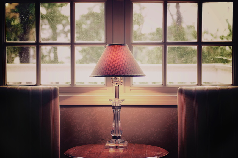 lamp, close-up, lighting equipment, table, window, torch lamp, indoors, glass, domestic room, glass - material, chair, torchere, clear, furniture, home interior