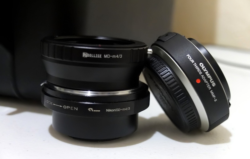 photography themes, olympus, minolta, lens, number, text, nikon, four third, table, close-up, focus on foreground, lens - optical instrument, single object