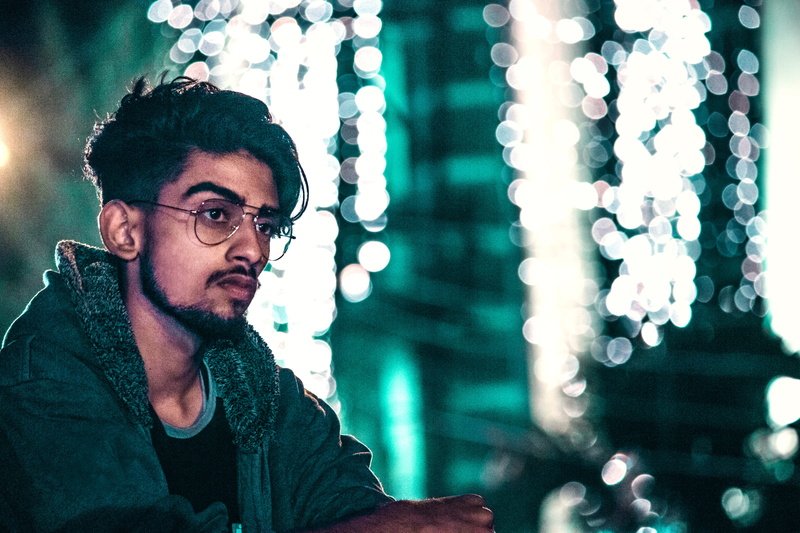 india, portrait, looking away, trend, lifestyles, bridge, life, night, leisure activity, clothing, model, headshot, street, one person, glasses, bokeh