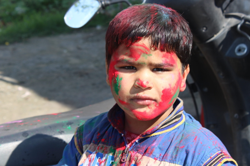 cheerful, lifestyles, looking at camera, happy, headshot, children, one person, celebration, paint, front view, real people, young adult, holi, casual clothing