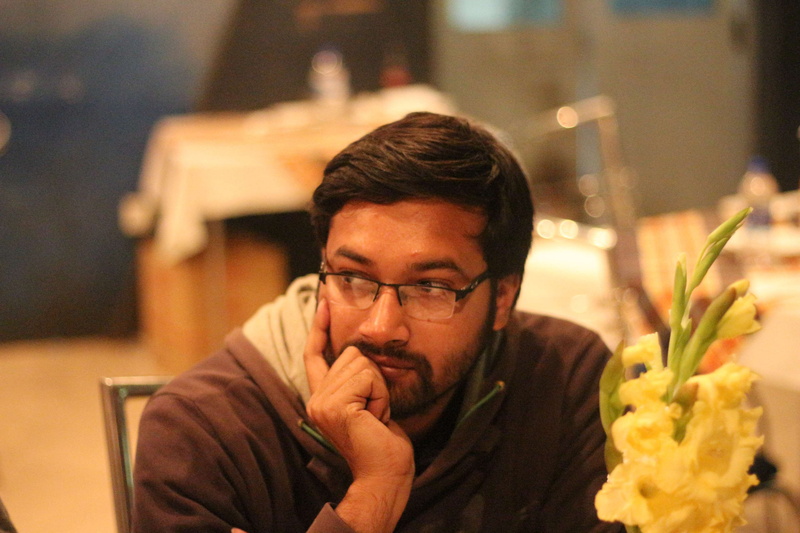 men, indoors, front view, facial hair, contemplation, beard, mid adult, adult, 4K, sitting, one person, mid adult men, headshot, business, sazedur rahman