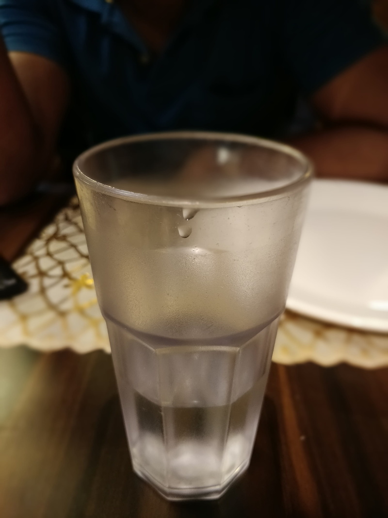 2K, freshness, glass, one person, india, table, human body part, milk, kolkata, holding, human hand, 1, refreshment, indoors, finger, real people, household equipment
