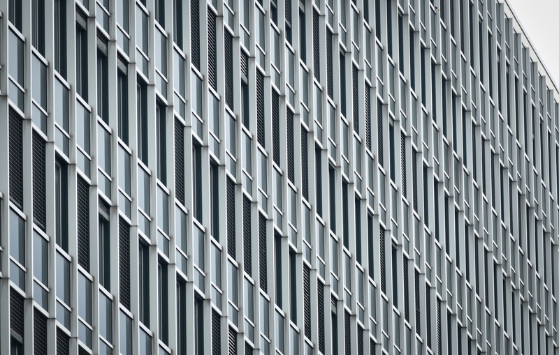 glass - material, structure, wall - building feature, office building, monotonous, building, facade, day, 5K, house facade, side, window, low angle view