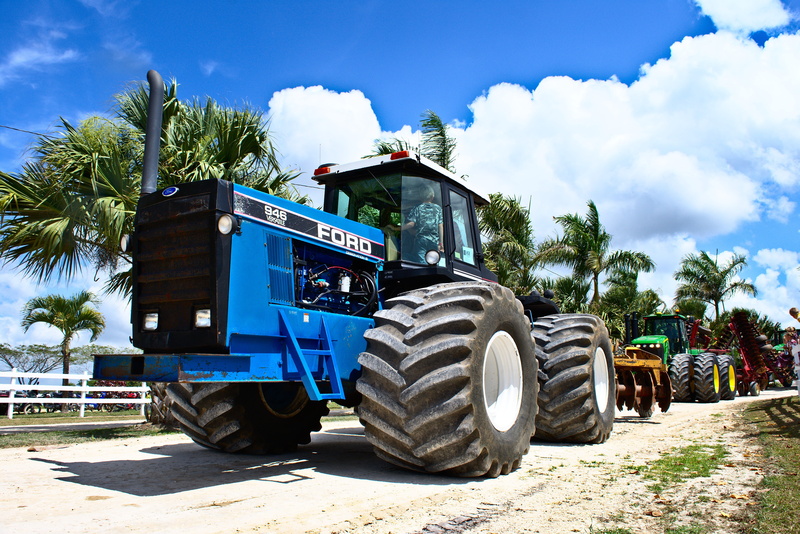 transportation, 5K, tropical climate, vehicle, palm tree, tread, blue, outdoors, machinery, power, farm, wheel, sky, low angle, metal, tractor, equipment