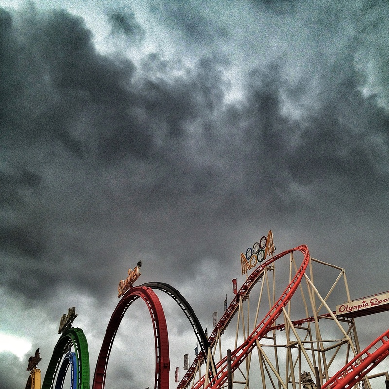 amusement park ride, grinding, year market, motion, metal, adrenaline, rollercoaster, speed, carnies, ominous, low angle view, overcast, built structure