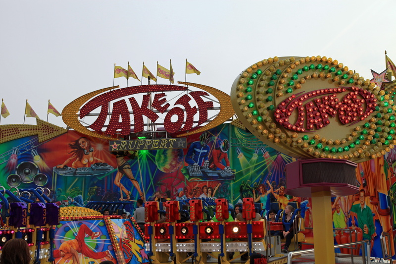 carousel, movement, carnival, folk festival, outdoors, sky, traveling carnival, no people, red, rides, sombrero, carnies, colorful, arts culture and entertainment