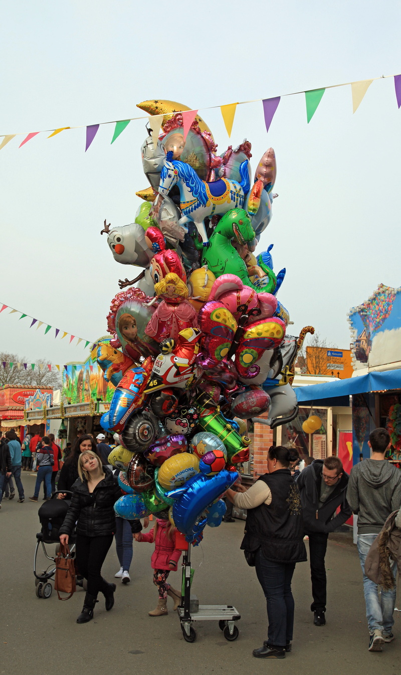 real people, art and craft, colorful, crowd, multi colored, air balloon seller, sky, fair, group of people, leisure activity, women, folk festival, color